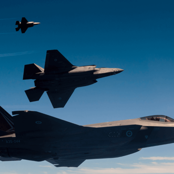 three f-35a lightning ii flying