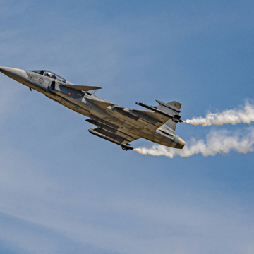 jas 39 gripen with smoke on