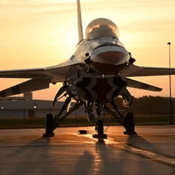 f-16 fighting falcon parked sunset