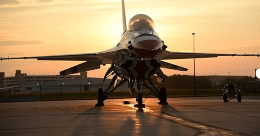 f-16 fighting falcon parked sunset