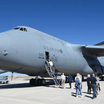 People boarding u.s. air force aircraft