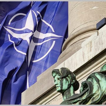 Nato Flag fluttering in Cinquantenaire Arcade